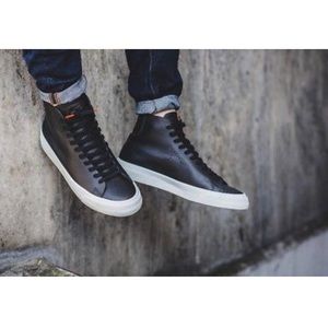 NWT. Black leather ankle Nike sneakers size 10.5